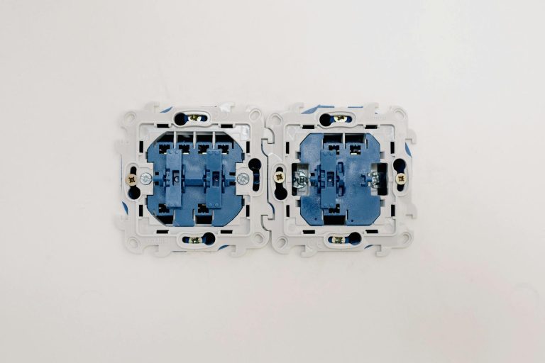 Detailed view of electrical sockets in a wall, ideal for renovation themes.